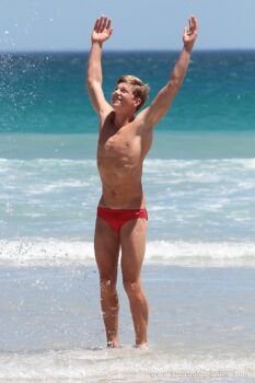 Nic, in his Red Speedos on the Beach.